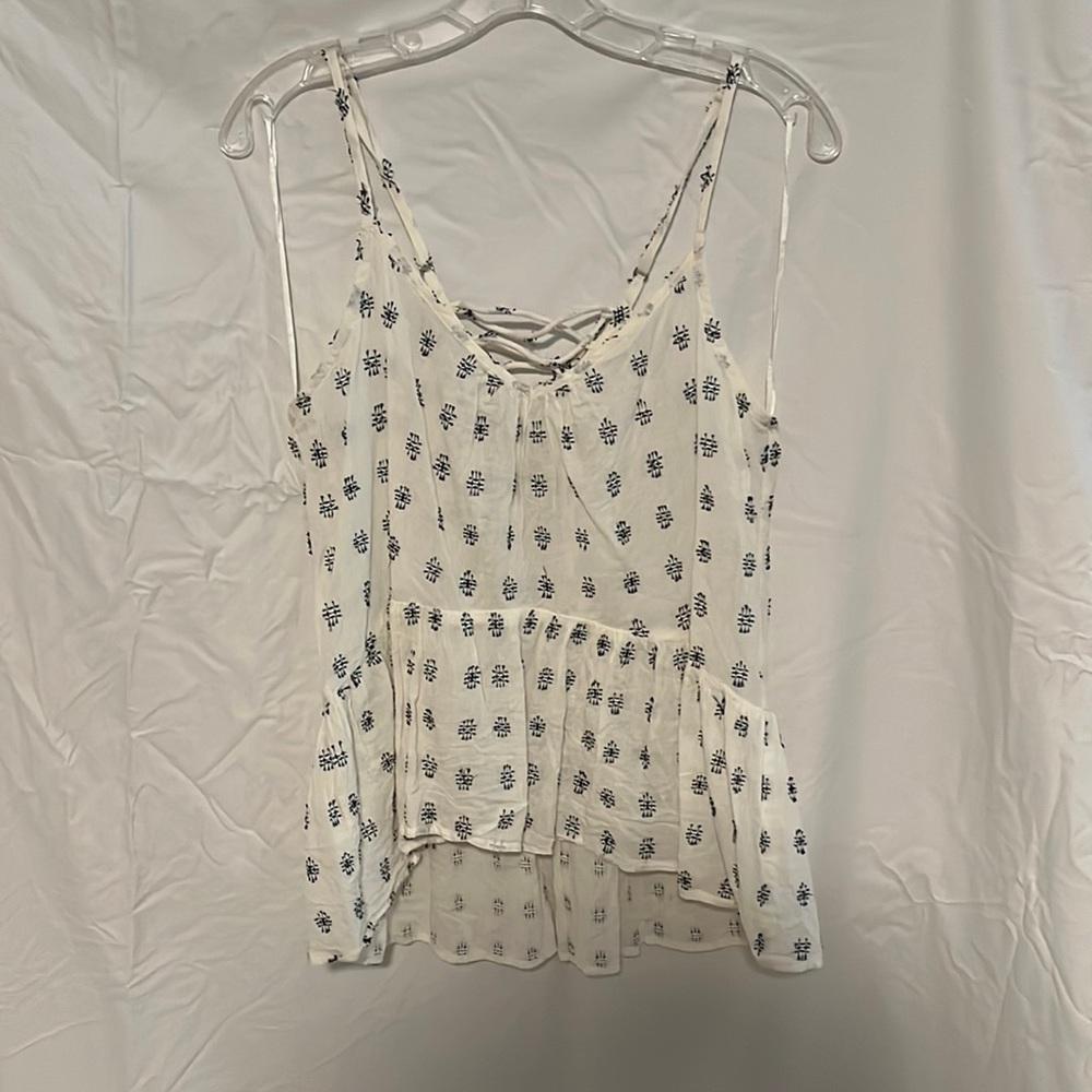 White tank with blue design